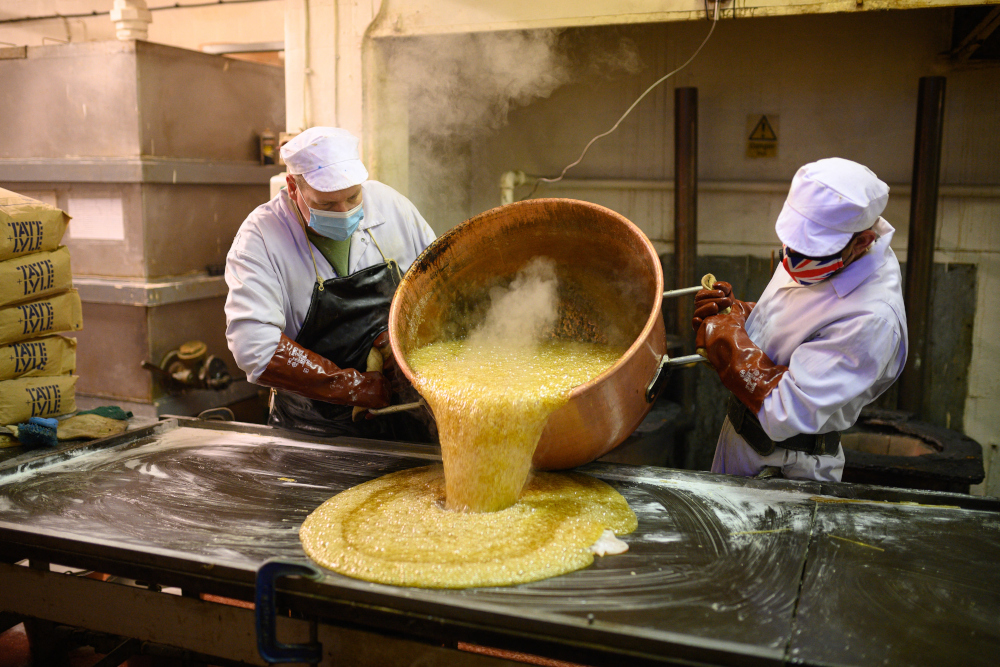 ‘Sugar Boilers’ employed at the traditional sweet manufacturer Edward Grays of Dudley. — AFP pic