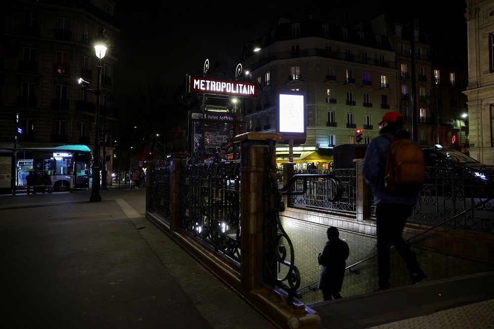 People walk outside a metro station operated by the Paris transport network RATP on the eve of a major strike by the public transport workers, in Paris, France February 17, 2022. u00e2u20acu2022 Reuters pic