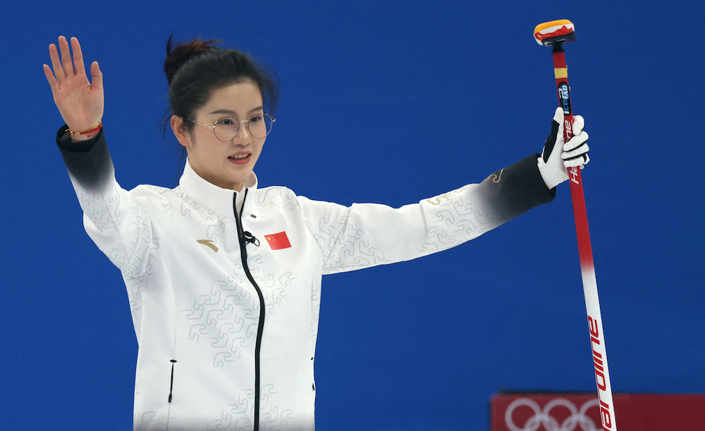 Fan Suyuan of China reacts after the game during the Mixed Doubles Round Robin Session 9 at the National Aquatics Centre in Beijing, February 5, 2022. u00e2u20acu2022 Reuters picnn
