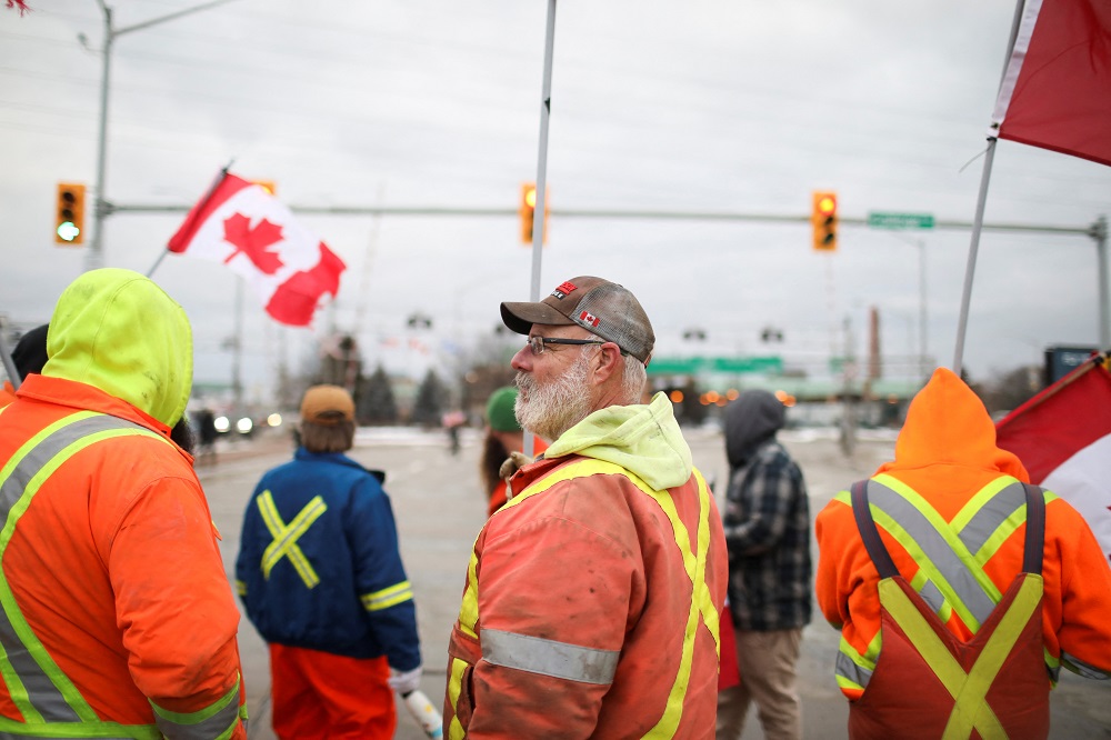 Truckers and supporters continue blocking access to the Ambassador Bridge, which connects Detroit and Windsor, in protest against Covid-19 vaccine mandates, in Windsor, Ontario, Canada February 10, 2022. u00e2u20acu2022 Reuters pic