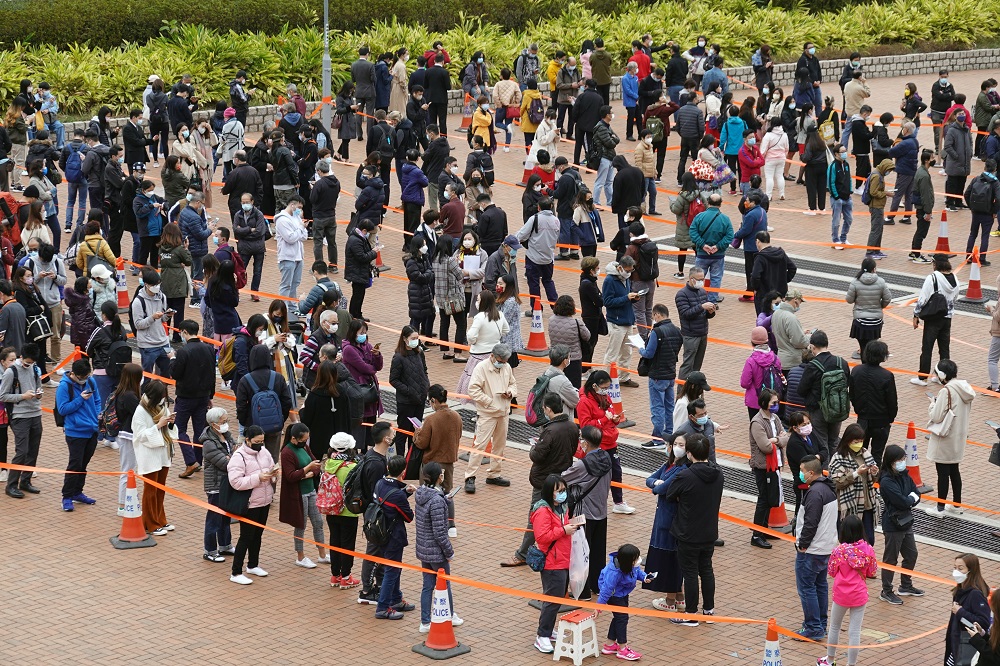 People queue at a makeshift nucleic acid testing centre for Covid-19 at the Central district in Hong Kong February 9, 2022. u00e2u20acu2022 Reuters pic