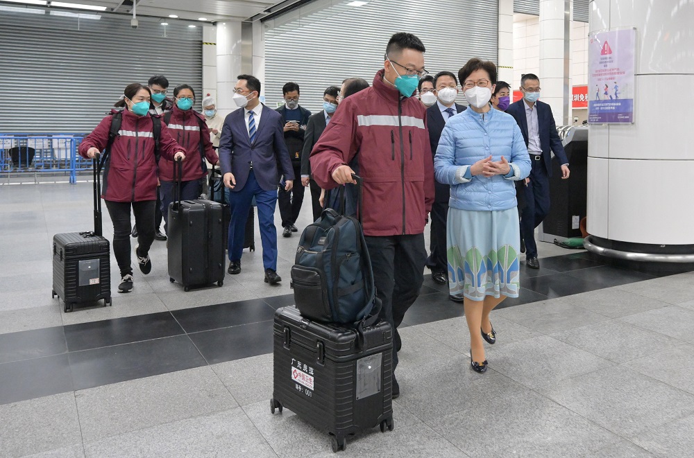 Hong Kong Chief Executive Carrie Lam welcomes Kang Min, director of the Infectious Disease Institute under the Guangdong Provincial Centre for Disease Control and Prevention, and other health experts from mainland China in Hong Kong February 18, 2022. u00e2u20acu2022