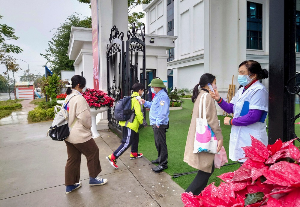 Students walk into a school as the Covid-19 norms for schools have been relaxed and reopened, in Hanoi, Vietnam February 8, 2022. u00e2u20acu2022 Reuters pic