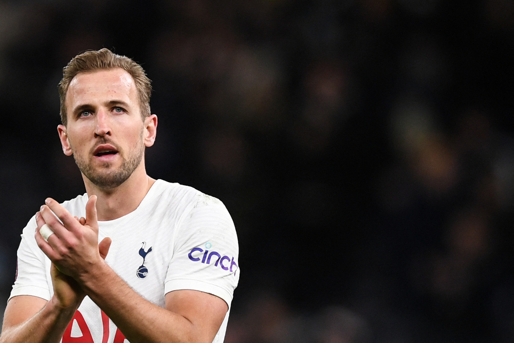 Tottenham Hotspuru00e2u20acu2122s English striker Harry Kane applauds at the end of the FA Cup fourth round match against Brighton and Hove Albion at the Tottenham Hotspur Stadium in London, February 5, 2022. u00e2u20acu2022 AFP pic 