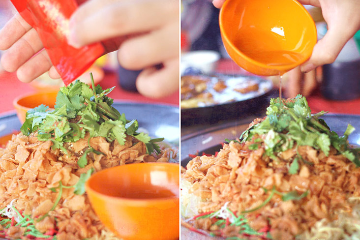 The chorus of auspicious sayings as each ingredient is added is part of the 'yee sang' tradition.