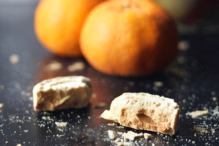 Mandarin oranges ('kam' in Cantonese, which sounds like ‘gold’) and almond cookies.