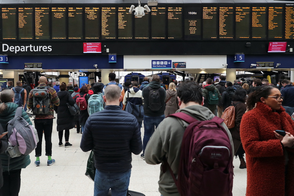 People wait at Waterloo station, as trains are delayed and cancelled after Storm Eunice, in London, Britain, February 19, 2022. u00e2u20acu2022 Reuters picnn