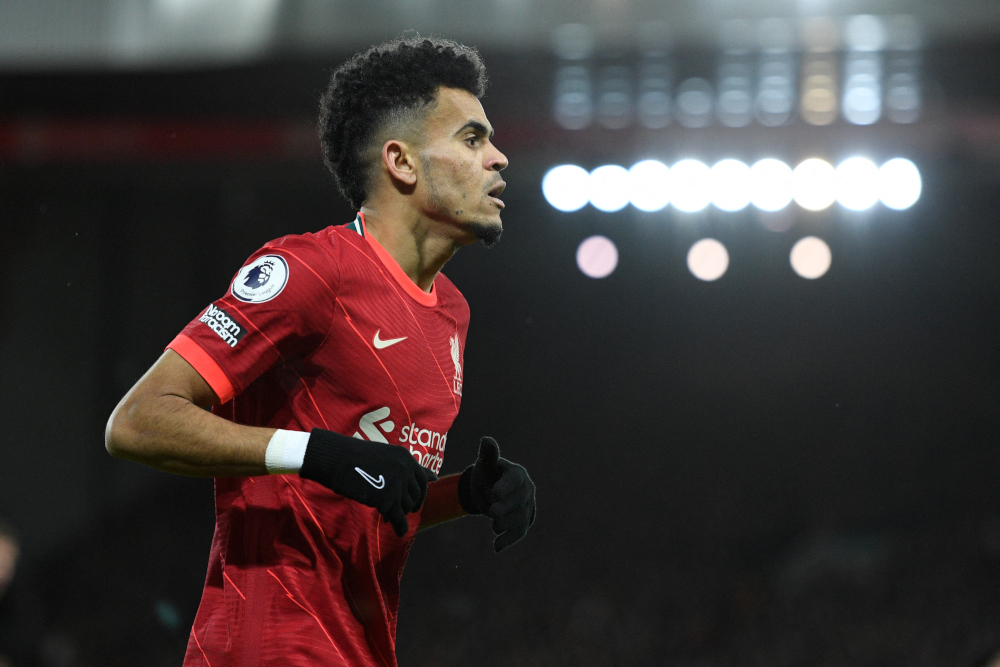 Liverpoolu00e2u20acu2122s Colombian midfielder Luis Diaz is seen under the floodlights during the English Premier League match against Leicester City at Anfield in Liverpool, February 10, 2022. u00e2u20acu2022 AFP picnn