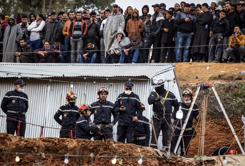 Moroccan emergency services teams work on the rescue of five-year-old boy Rayan from a well shaft he fell into on February 1, in the remote village of Ighrane in the rural northern province of Chefchaouen on February 5, 2022. u00e2u20acu2022 AFP picnn