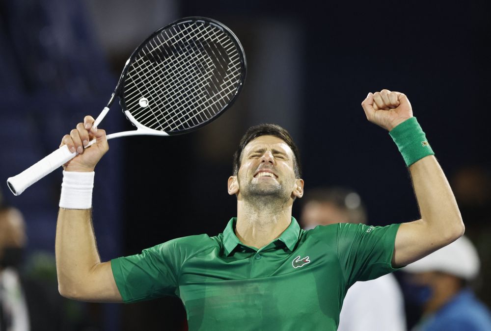 Serbia's Novak Djokovic celebrates winning his first round match against Italy's Lorenzo Musetti at the Aviation Club Tennis Centre, Dubai February 21, 2022. u00e2u20acu201d Reuters picnnnn