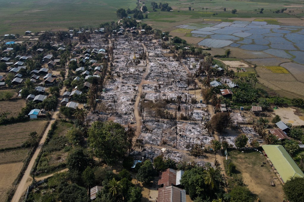 This handout photo by Chin Twin Chit Thu taken on February 3, 2022 and released on taken on February 5, 2022 shows an aerial photo of burnt buildings from fires in Mingin Township, in Sagaing Division, where more than 105 buildings were destroyed by junta