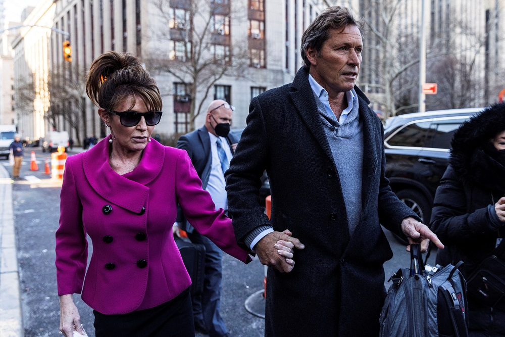 Sarah Palin (left) departs with former NHL hockey player Ron Duguay during her defamation lawsuit against the New York Times, at the United States Courthouse in the Manhattan borough of New York City February 9, 2022. u00e2u20acu2022 Reuters pic