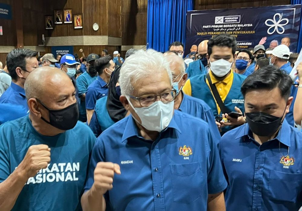 Perikatan Nasional (PN) secretary-general Datuk Seri Hamzah Zainudin (centre) with the coalitionu00e2u20acu2122s supporters at the Malaysian Productivity Centre (MPC) in Bandar Baru Uda, Johor Baru, February 11, 2022. u00e2u20acu201d Picture by Ben Tan