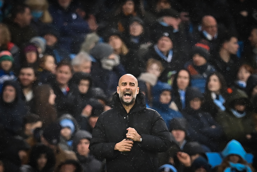Manchester City manager Pep Guardiola reacts during the English FA Cup fourth round match between Manchester City and Fulham at the Etihad Stadium in Manchester, February 5, 2022. u00e2u20acu2022 AFP pic