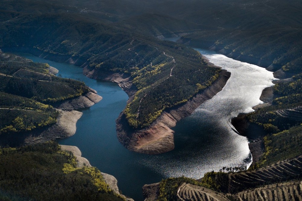 This photograph shows a floating pool resting on dry land due to the drop of the water level at Vilar, on the shores of the Zezere river in Pampilhosa da Serra, central Portugal on February 8, 2022. — AFP pic