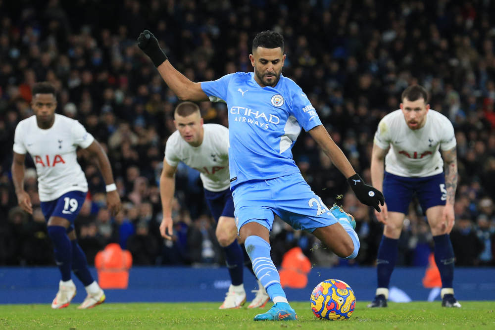 Manchester City midfielder Riyad Mahrez scores their second goal from the penalty spot during the English Premier League match between against Tottenham Hotspur at the Etihad Stadium in Manchester, February 19, 2022. u00e2u20acu201d AFP pic 