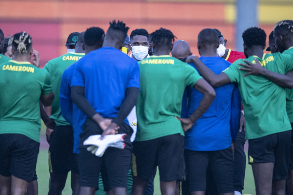 Cameroon Football Federation president Samuel Etou00e2u20acu2122o (centre), talks to Cameroonu00e2u20acu2122s players before a training session at Japoma Stadium in Douala January 28, 2022 on the eve of the 2021 Africa Cup of Nations match between Gambia and Cameroon. u00e2u20acu201d AFP pi