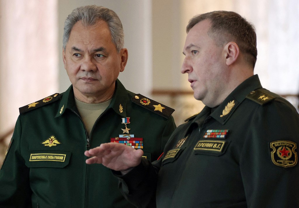 Russia's Defence Minister Sergei Shoigu (left) speaks with his Belarus counterpart Viktor Khrenin (right) prior to a meeting with Belarus President in Minsk on February 3, 2022. u00e2u20acu201d AFP pic