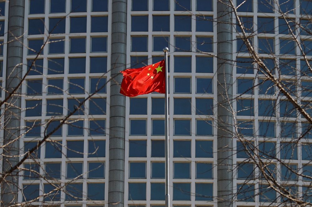 A Chinese flag flutters outside the Chinese foreign ministry in Beijing, China February 24, 2022. u00e2u20acu2022 Reuters pic