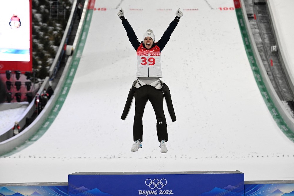 Gold medallist Sloveniau00e2u20acu2122s Ursa Bogataj celebrates after winning the Ski Jumping Womenu00e2u20acu2122s Normal Hill Individual Final Round, on February 05, 2022 at the Zhangjiakou National Ski Jumping Centre, during the Beijing 2022 Winter Olympic Games. u00e2u20acu2022 AFP picn