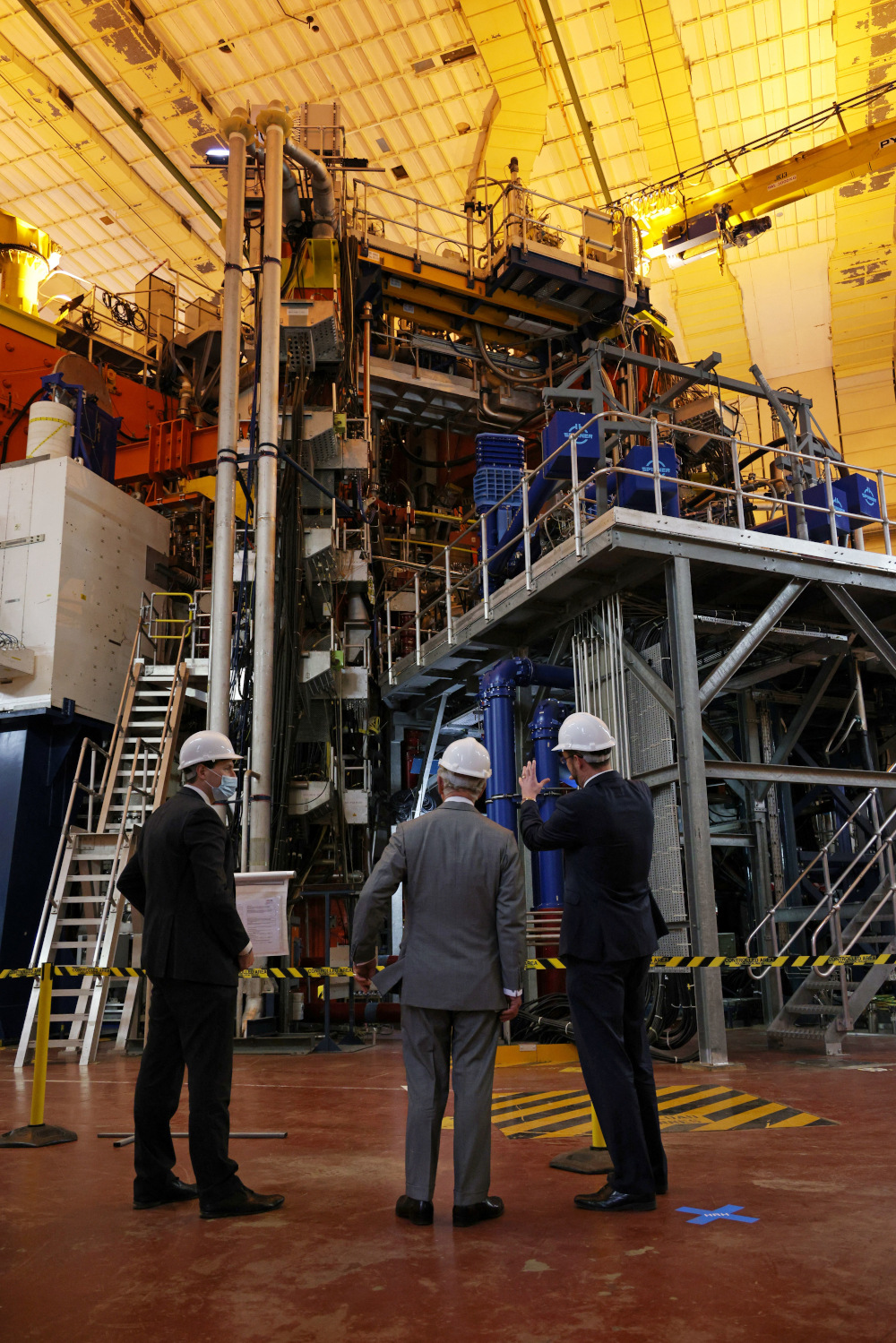 Britainu00e2u20acu2122s Prince Charles, Prince of Wales (centre) is shown the Joint European Torus (JET) at the UK Atomic Energy Authority in Culham, near Abingdon on January 31, 2022. u00e2u20acu201d AFP pic