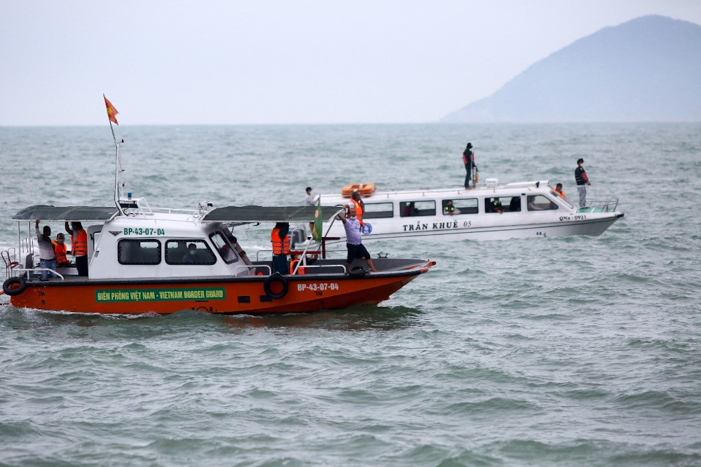Rescuers look for survivors from search boats after a vessel carrying tourists capsized in the waters between Cu Lao Cham island and Hoi An on Vietnamu00e2u20acu2122s central coast on February 26, 2022 killing at least 13 people. u00e2u20acu201d AFP pic