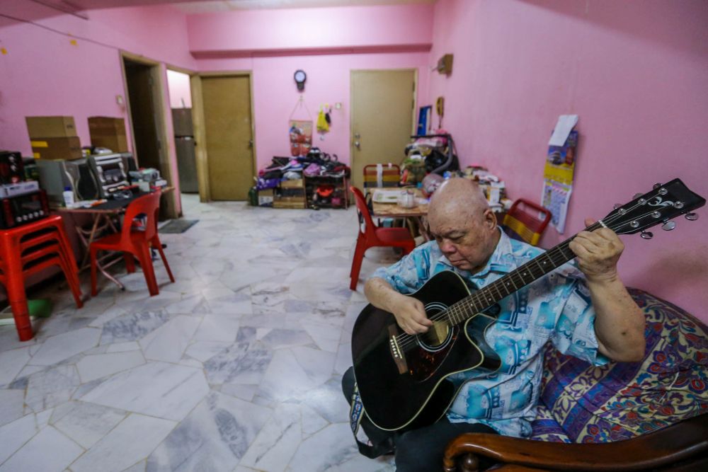 Alfred Ho was a professional singer whose busking career was impacted by the pandemic. u00e2u20acu201d Picture by Hari Anggara