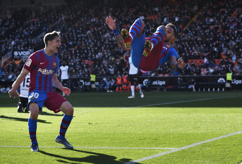 FC Barcelona's Pierre-Emerick Aubameyang celebrates scoring their first goal against Valencia with Gavi at Mestalla, Valencia February 20, 2022. u00e2u20acu201d Reuters picn