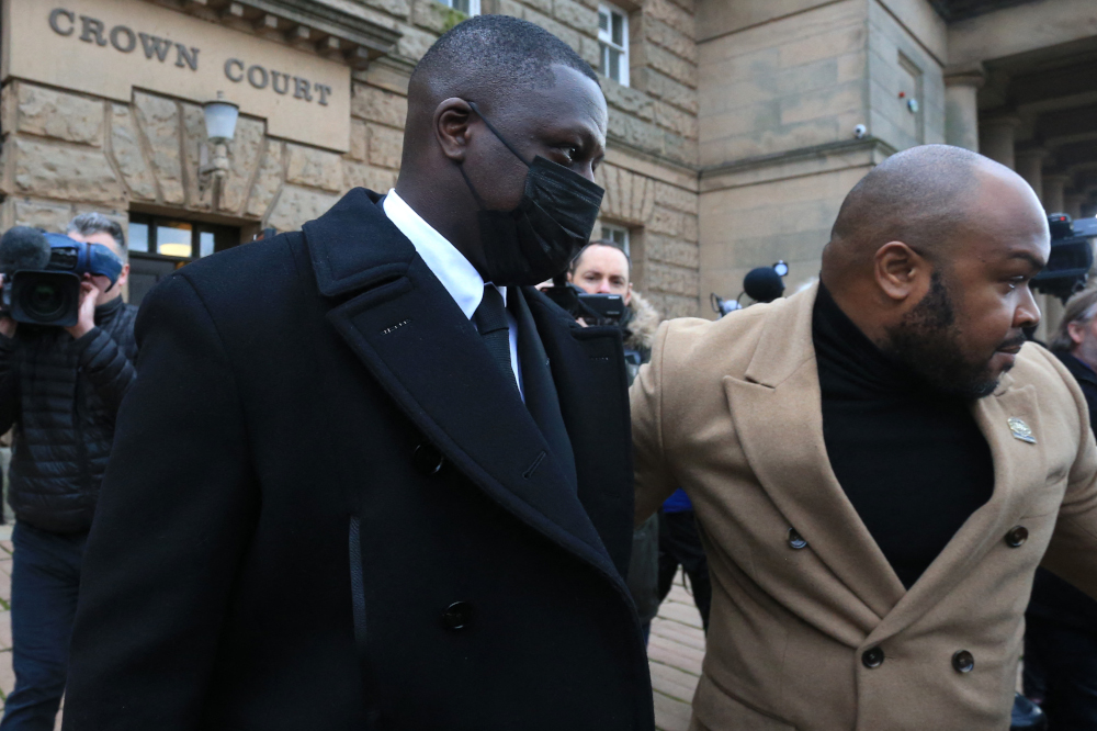 Benjamin Mendy (left) leaves after a pre-trial hearing at Chester Crown Court in Chester, north-west England, February 2, 2022. u00e2u20acu201d AFP pic 