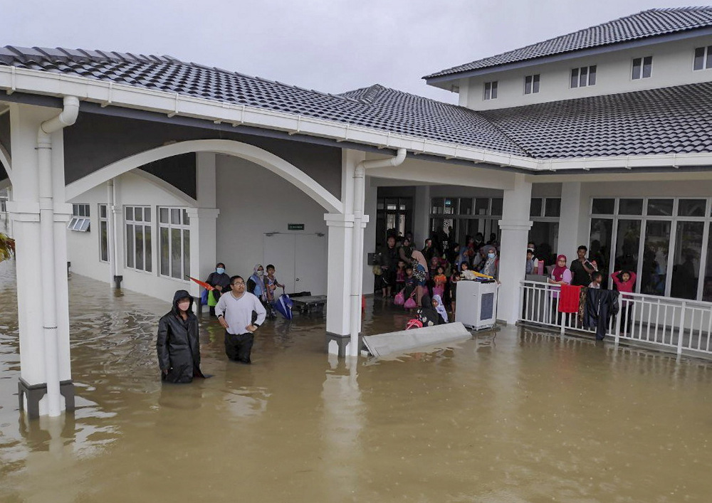Some of the victims trapped by heavy rains at a surau in Taman Perumahan Prima, Lubuk Jong in Pasir Mas February 27, 2022. u00e2u20acu201d Bernama pic