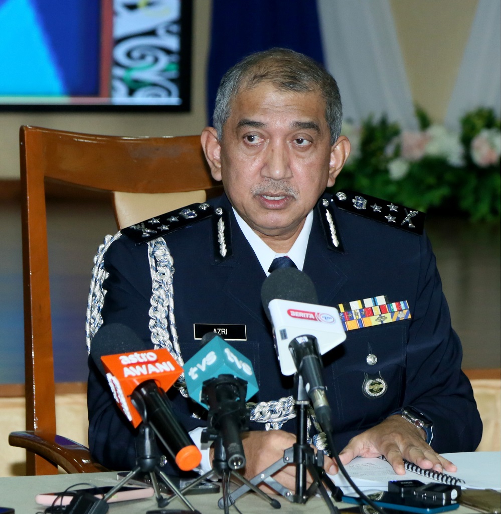 Bukit Aman Integrity and Standards Compliance Department director Datuk Azri Ahmad speaks at the press conference held at the Sarawak Police Contingent Headquarters. u00e2u20acu2022 Borneo Post pic