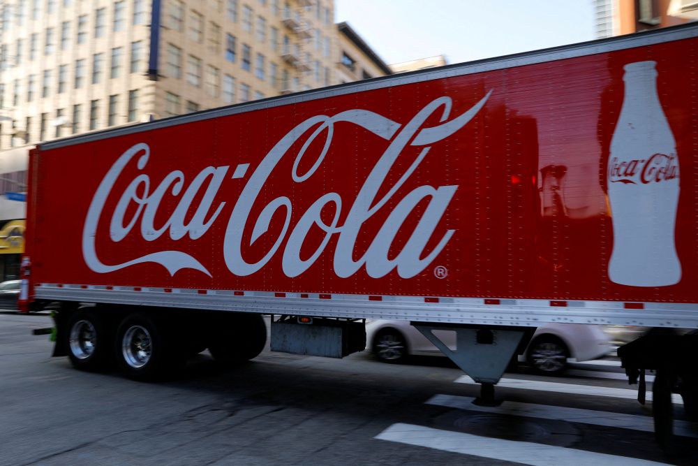 A Coca-Cola truck makes its way through downtown Los Angeles, California October 24, 2018. u00e2u20acu201d Reuters pic