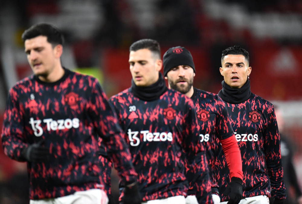 Manchester Unitedu00e2u20acu2122s Cristiano Ronaldo, Luke Shaw, Harry Maguire and Diogo Dalot during the warm-up before the match against Brighton & Hove Albion at Old Trafford, Manchester, February 15, 2022. u00e2u20acu201d Reuters picnn