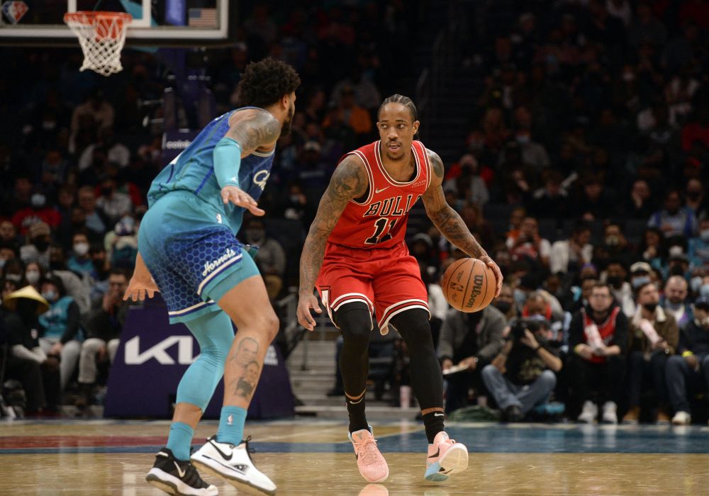 Chicago Bulls forward DeMar DeRozan (11) looks to drive down court past Charlotte Hornets forward Miles Bridges (0) during the second half at the Spectrum Centre, Charlotte February 9, 2022.  u00e2u20acu201d Reuters pic