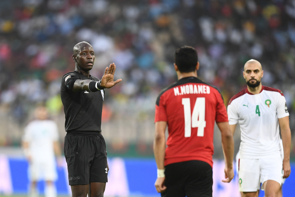 Senegalese referee Maguette Nu00e2u20acu2122diaye (left) gestures during the Africa Cup of Nations 2021 quarter-final football match between Egypt and Morocco at Stade Ahmadou Ahidjo in Yaounde, January 30, 2022. u00e2u20acu201d AFP pic 
