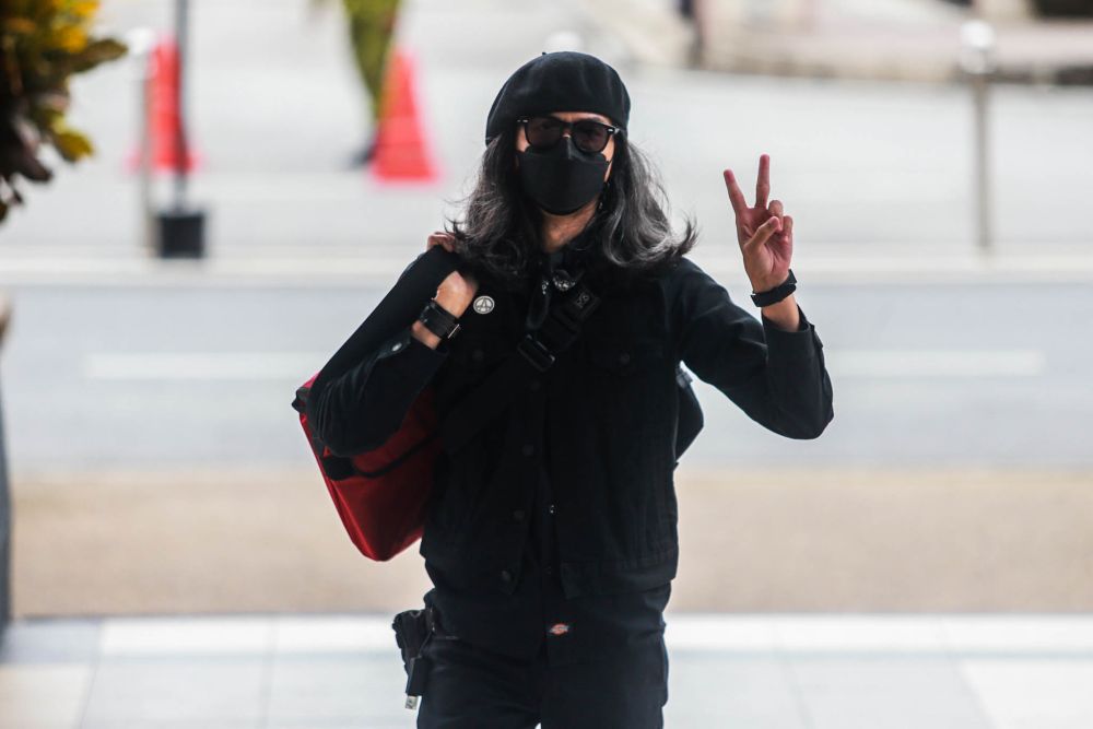 Activist Fahmi Reza arrives at the Kuala Lumpur High Court February 10, 2022.  u00e2u20acu201d Picture by Hari Anggaran