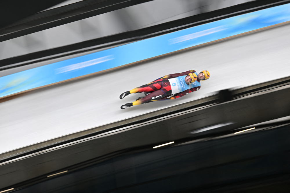 Germanyu00e2u20acu2122s Tobias Arlt and Tobias Wendl compete in the final run of the luge doubles event at the Yanqing National Sliding Centre, February 9, 2022. u00e2u20acu2022 AFP picnn