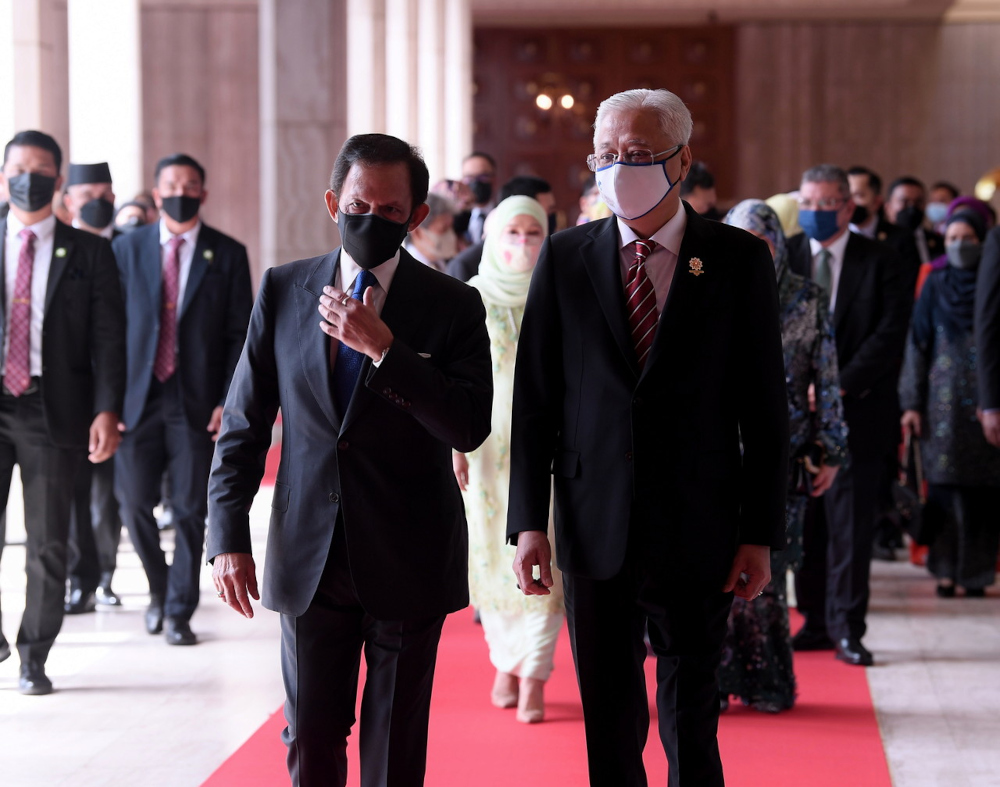 Bruneiu00e2u20acu2122s Sultan Hassanal Bolkiah with Prime Minister Datuk Seri Ismail Sabri Yaakob at Istana Nurul Iman in Brunei, February 15, 2022. u00e2u20acu201d Bernama pic
