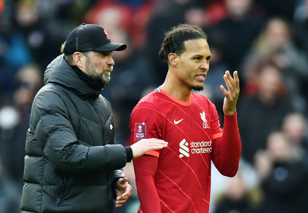 Liverpool manager Jurgen Klopp speaks with Virgil van Dijk after the match against Cardiff City at Anfield, Liverpool, February 6, 2022. u00e2u20acu2022 AFP pic 
