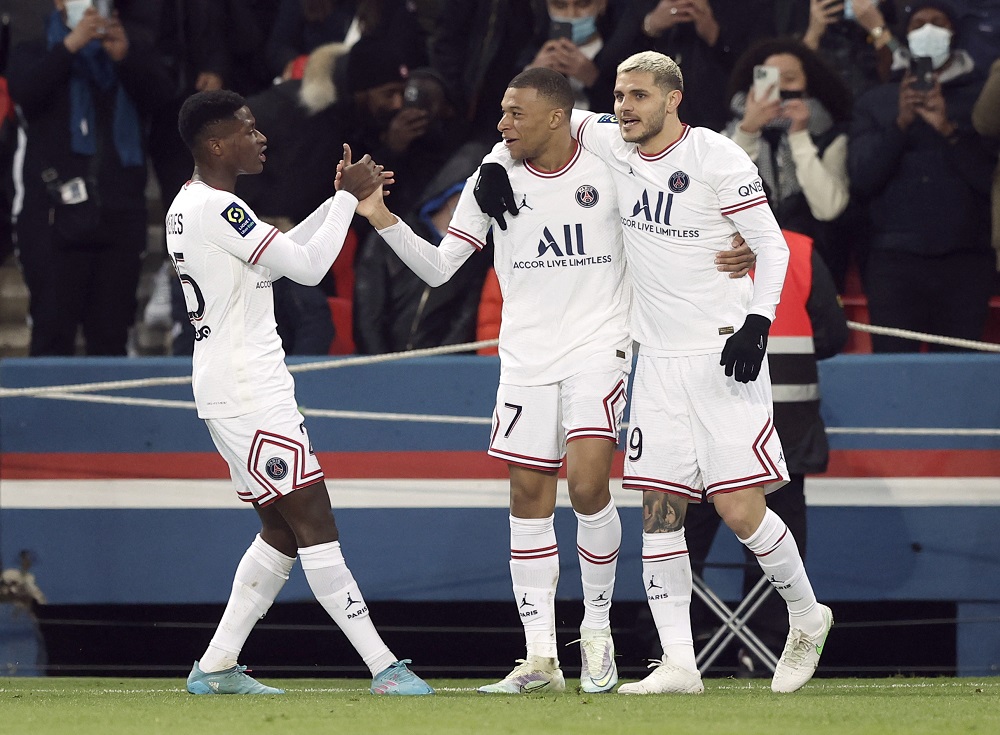 Paris St Germain's Kylian Mbappe celebrates with teammates after scoring the first goal against Stade Rennes February 12, 2022. u00e2u20acu2022 Reuters pic