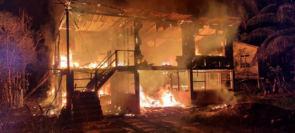 The fire that engulfed the house in Kampung Seberang Kedai last night claimed the lives of three young brothers. u00e2u20acu201d Picture courtesy of the Sarawak Fire and Rescue Department