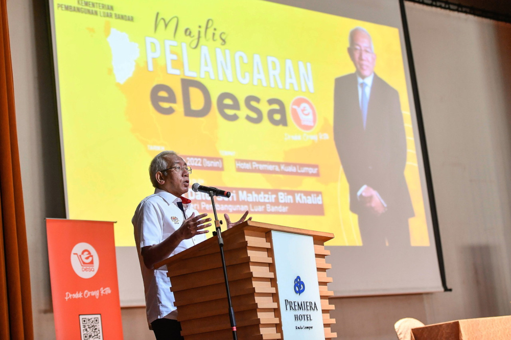 Rural Development Minister Datuk Seri Mahdzir Khalid delivers a speech at the launch of the eDesa App in Kuala Lumpur, February 21, 2022. u00e2u20acu201d Bernama picnn