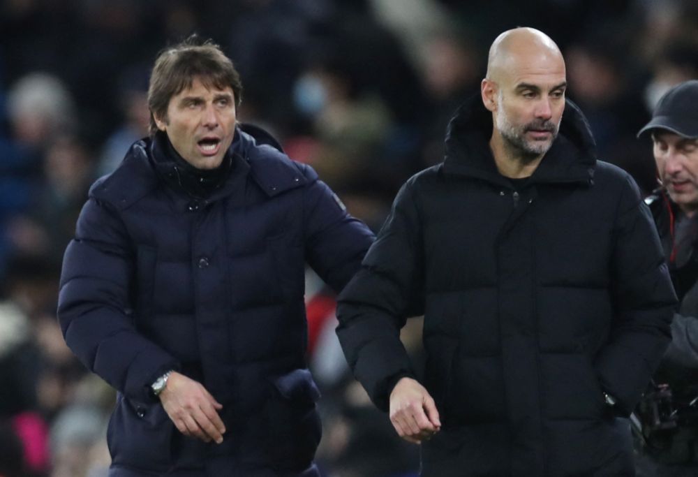 Manchester City manager Pep Guardiola and Tottenham Hotspur manager Antonio Conte after the match, Etihad Stadium, Manchester, February 19, 2022. u00e2u20acu201d Reuters pic