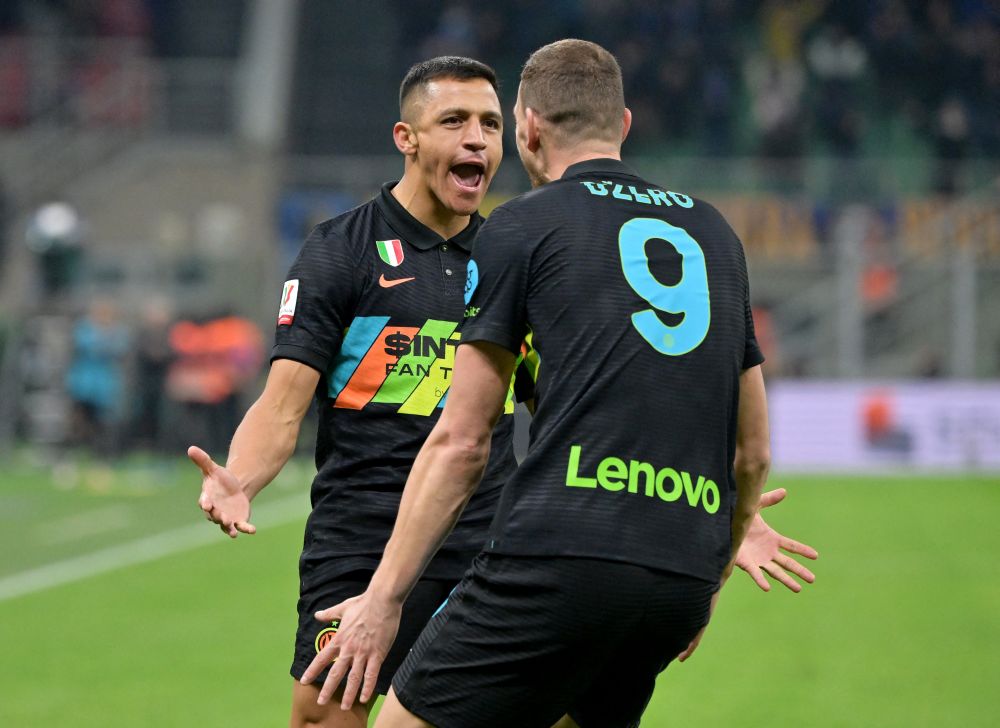 nInter Milan's Alexis Sanchez celebrates scoring their second goal against AS Roma with teammate Edin Dzeko at San Siro, Milan February 8, 2022. u00e2u20acu201d Reuters picn