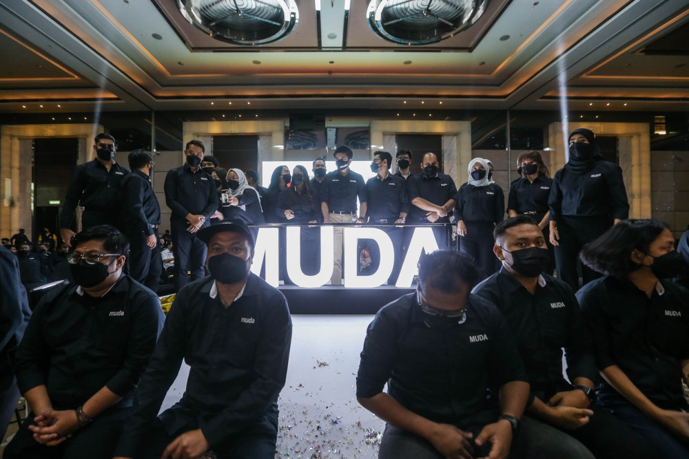 Muda president Syed Saddiq Syed Abdul Rahman with the partyu00e2u20acu2122s top leaders during its launch ceremony at the Connexion Conference & Events Centre in Kerinchi, February 11, 2022. u00e2u20acu2022 Picture by Hari Anggara