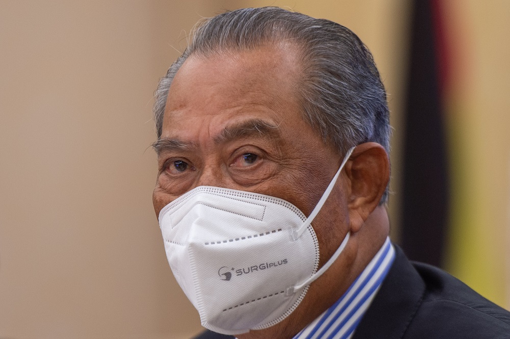 Tan Sri Muhyiddin Yassin speaks during a press conference in Putrajaya February 22, 2022. ― Picture by Shafwan Zaidon