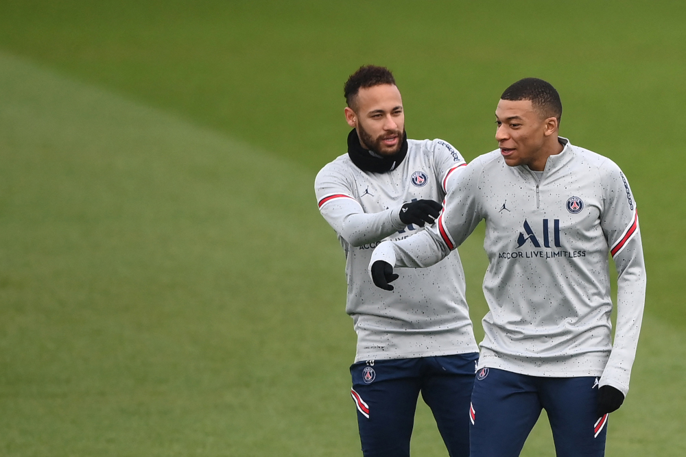 Paris Saint-Germain forward Neymar jokes with Kylian Mbappe during a training session at the Camp des Loges Paris Saint-Germain football clubu00e2u20acu2122s training ground, February 10, 2022. u00e2u20acu2022 AFP pic 