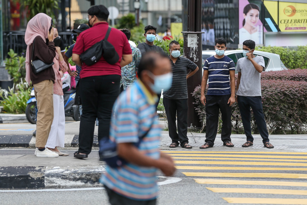 Despite a surge in Covid-19 cases and the spread of the Omicron variant, people continue to throng the Bukit Bintang area, February 9, 2022. u00e2u20acu2022 Picture by Hari Anggara