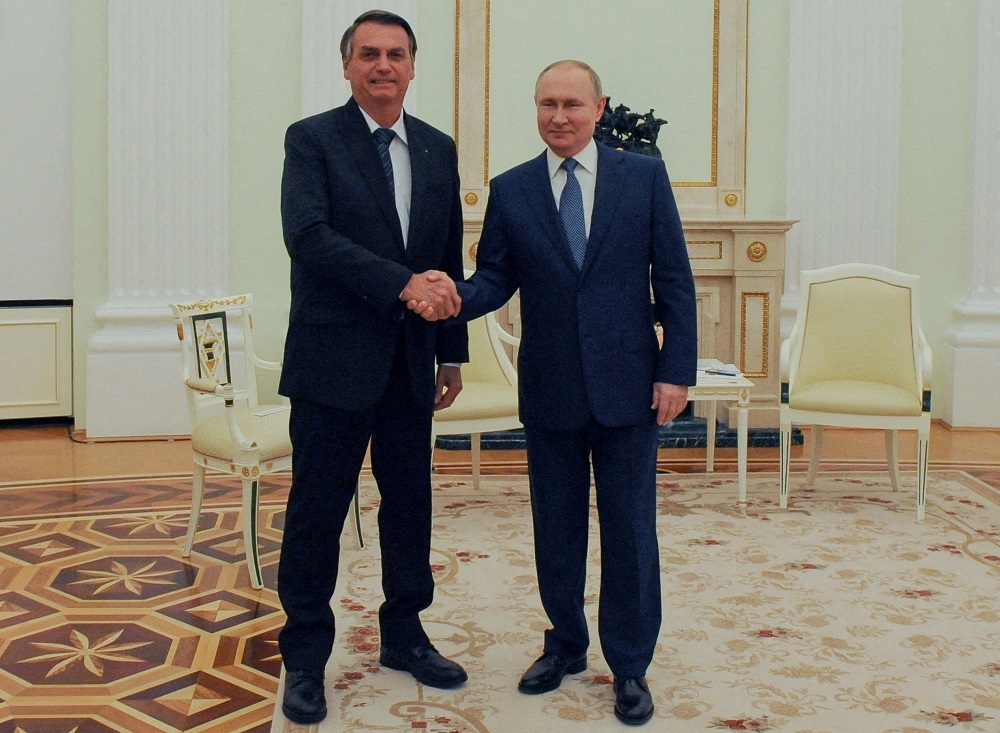 Russian President Vladimir Putin shakes hands with his Brazilian counterpart Jair Bolsonaro during a meeting in Moscow, Russia February 16, 2022. u00e2u20acu2022 Reuters file pic