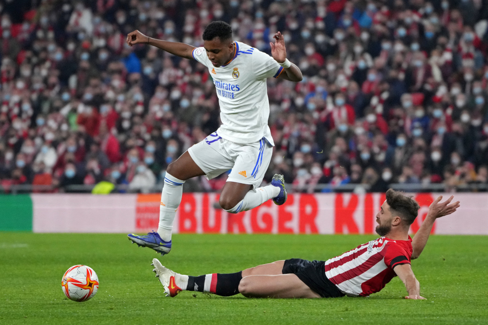 Real Madrid forward Rodrygo vies with Athletic Bilbao defender Oscar De Marcos during the Spanish Copa del Rey quarter-final match at the San Mames stadium in Bilbao, February 3, 2022. u00e2u20acu201d AFP picnn